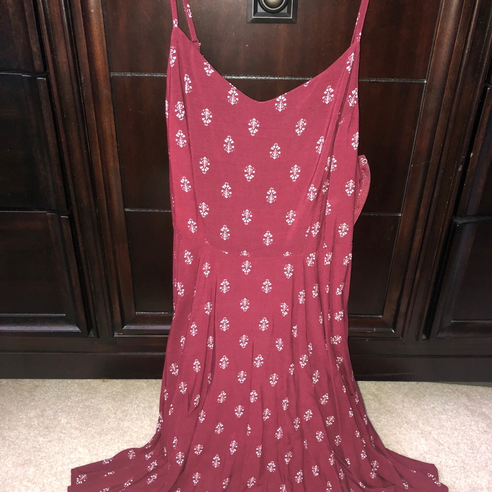 red skater dress with white patterns